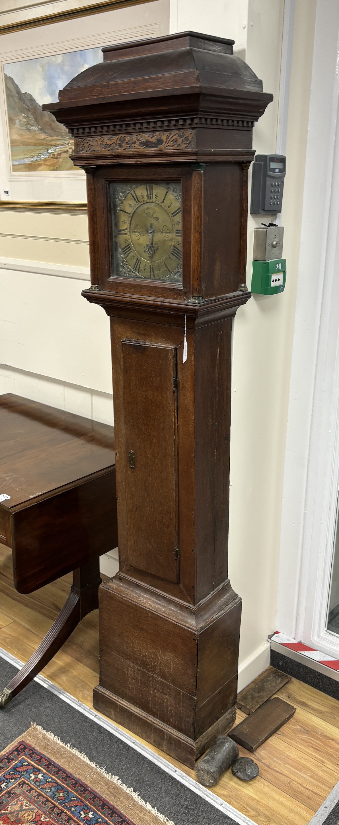 An 18th century oak thirty hour longcase clock, the 10in. square dial marked William Bassett, Mayfield, height 196cm